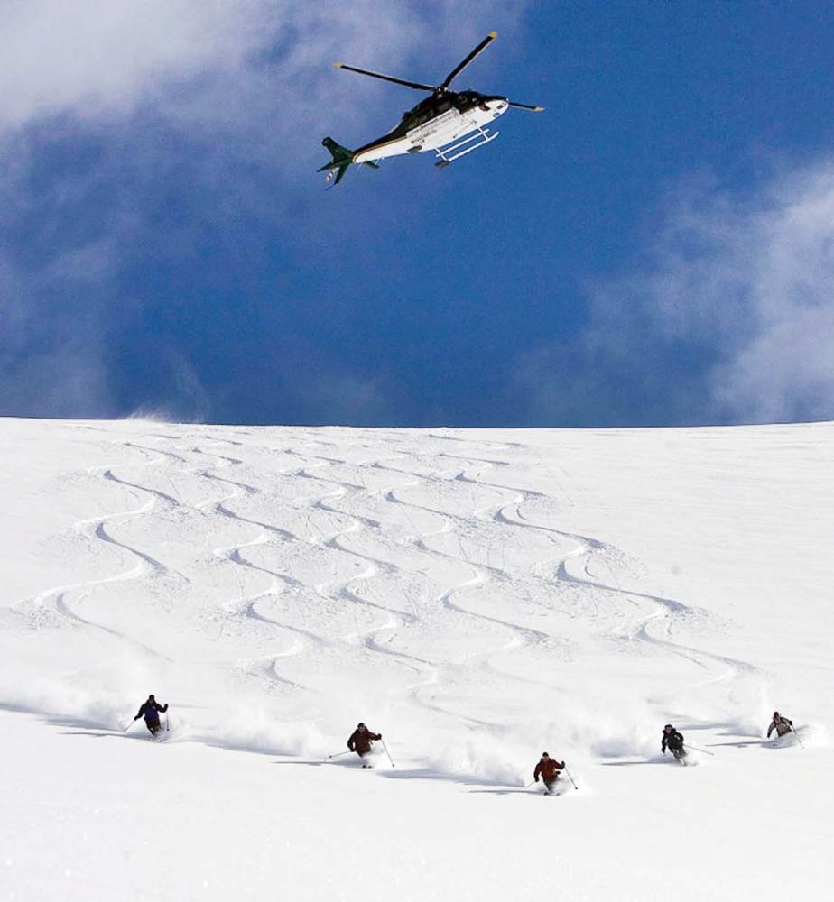 Heli Flying Over Group Powder Turns 952x1030 copy