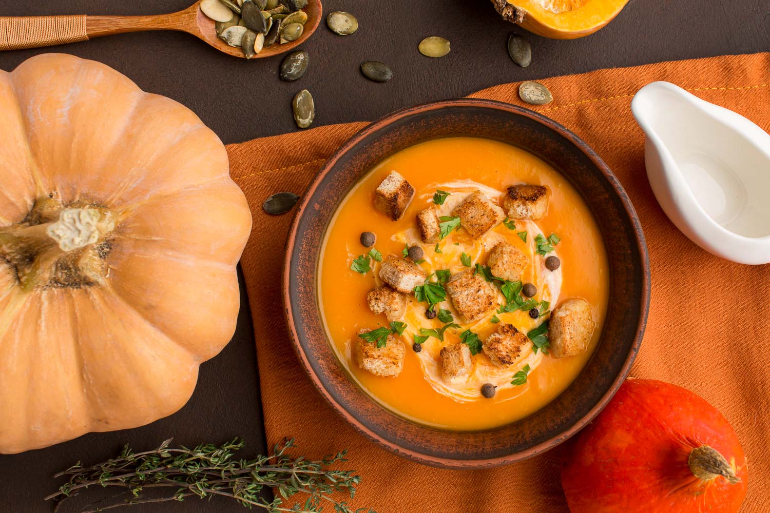 flat lay winter squash soup bowl with croutons